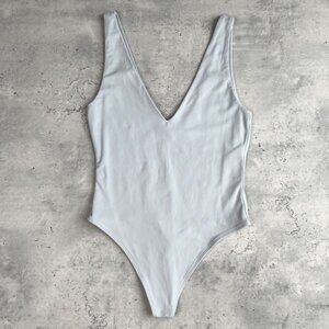 Aritzia Babaton baby blue plunge v-neck bodysuit